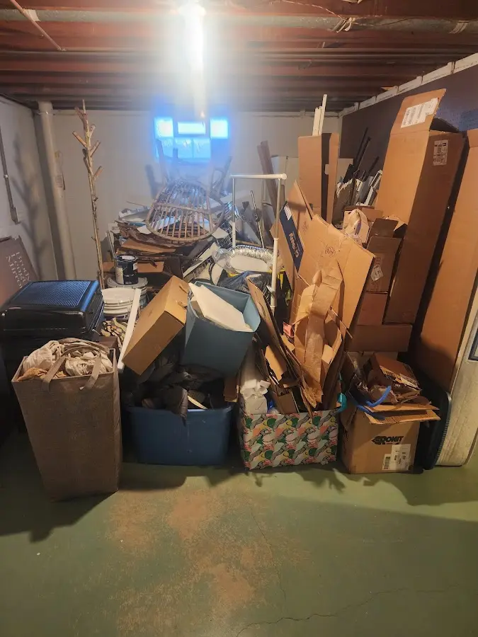 Roll-off dumpster container at job site for 2 Yard Dumpster Rental in Otsego